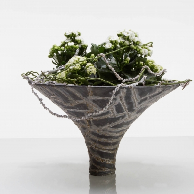 Wit Kalanchoë plantenarrangement met lood