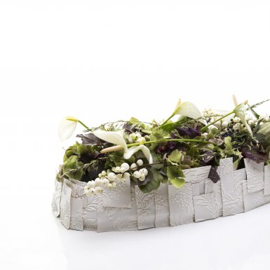 Wit afscheidsbloemwerk met anthuriums